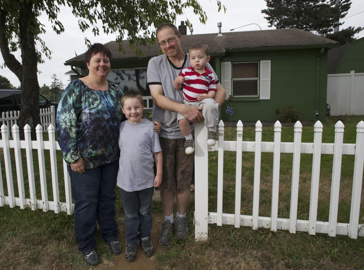 Rose Village residents Joel and Melissa Dodge say the St. Johns interchange project has had an adverse effect on their son Dylan, 6, who is autistic. Also pictured in their younger son, Lucas, 19 months.