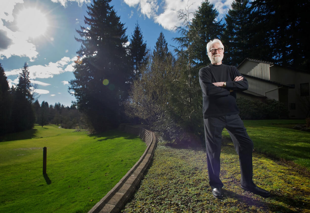 Mark Gawecki, secretary of the Greater Brush Prairie Neighborhood Association and an opponent of being annexed into the city limits of Battle Ground, stands at the back of his property, abutting a golf course that's inside Battle Ground city limits.