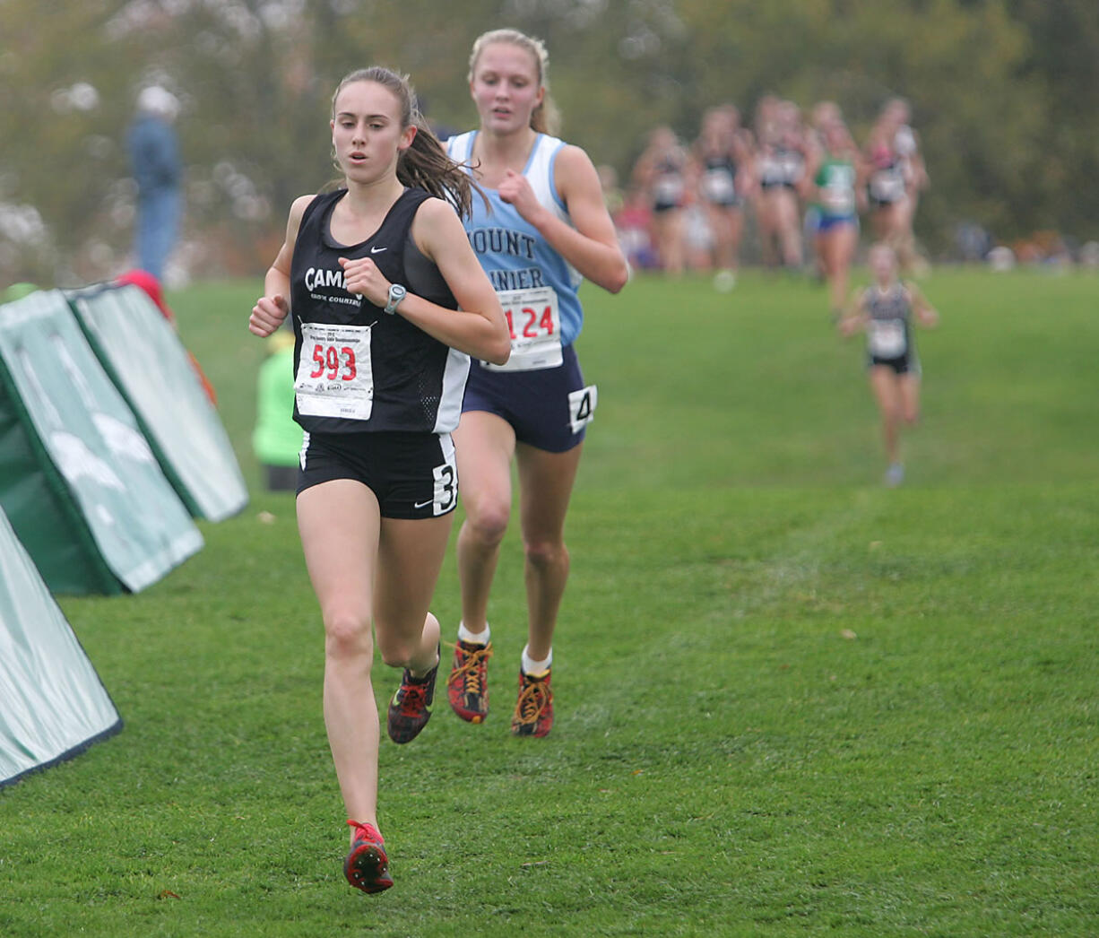 Alexa Efraimson of Camas High School leads Jordan McPhee of Mt. Rainier during the first lap of the girls 4A Sate Cross Country finals Saturday at Sun Willows in Pasco.