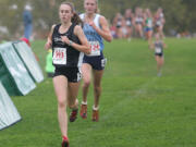 Alexa Efraimson of Camas High School leads Jordan McPhee of Mt. Rainier during the first lap of the girls 4A Sate Cross Country finals Saturday at Sun Willows in Pasco.