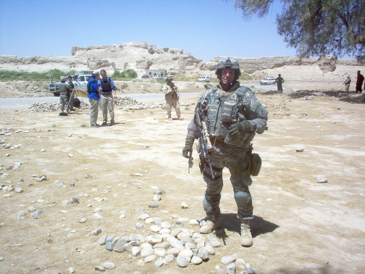 Courtesy of Mike Settles
Sgt. Major Mike Settles at the ruins of the ancient fortress Qala Bist in Afghanistan, where a photojournalist was filming a road-building project.