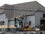 Crews work to finish up renovations on the American Legion Hall at 1554 N.E. Third Ave. On Tuesday, Nov. 20, its new occupants, CID Bio-Science, will welcome the public during an open house from 10 a.m.