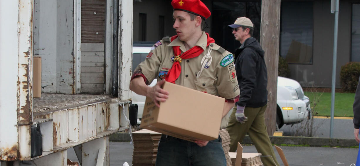 Last year, donations collected by Walk &amp; Knock volunteers were brought to the Tidland Corp., parking lot in Camas, one of 10 drop off sights throughout Clark County. There, the non-perishable food items were boxed up and loaded into a truck by volunteers including members of Boy Scout and Girl Scout troops and other service organizations. This year's Walk &amp; Knock food drive is scheduled for Saturday.