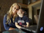 Diamond Tea organizer Angela Maitland, 35, and her 4-year-old son, Xavier, at their Brush Prairie home.