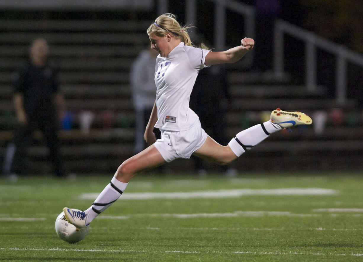 Columbia River's Maddie Reynolds takes a shot Wednesday in the first half of Columbia River's 2-1 win over Seattle Prep in the 4A girls playoff match at Kiggins Bowl.