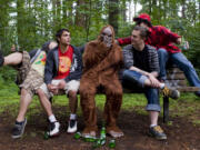 Marina French
The Sindicate -- Josh Garrett, from left, Stephen Clark, Dominic Bianchini and James Davenport -- sits with the namesake of its upcoming second album, &quot;Sasquatch.&quot; The reggae rock group will kick off its summer tour July 13 at the Brickhouse Bar and Grill.