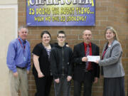 Umpqua Bank recently donated $2,000 to Jemtegaard Middle School through its &quot;Give Back to School Fund.&quot; Pictured here are, left to right, Principal Ron Carlson, parent/nominator Jenny Dayley, student Cameron Dayley, special education teacher Lou Peterson and fund organizer Lori Wick.