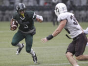 Portland State running back David Jones (3) rushes against Montana.