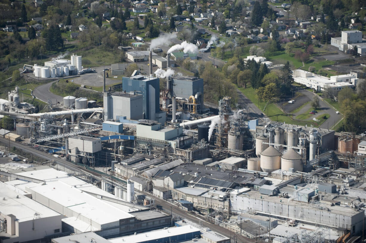 An aerial view of the Georgia-Pacific paper mill in Camas on March 26. &quot;When I graduated from high school, those in my class who hiked down the hill were basically guaranteed a good paying job from Crown Zellerbach,&quot; said former Camas Mayor Nan Henriksen, who helped diversify the city&#039;s economy away from reliance on the mill in the 1980s.