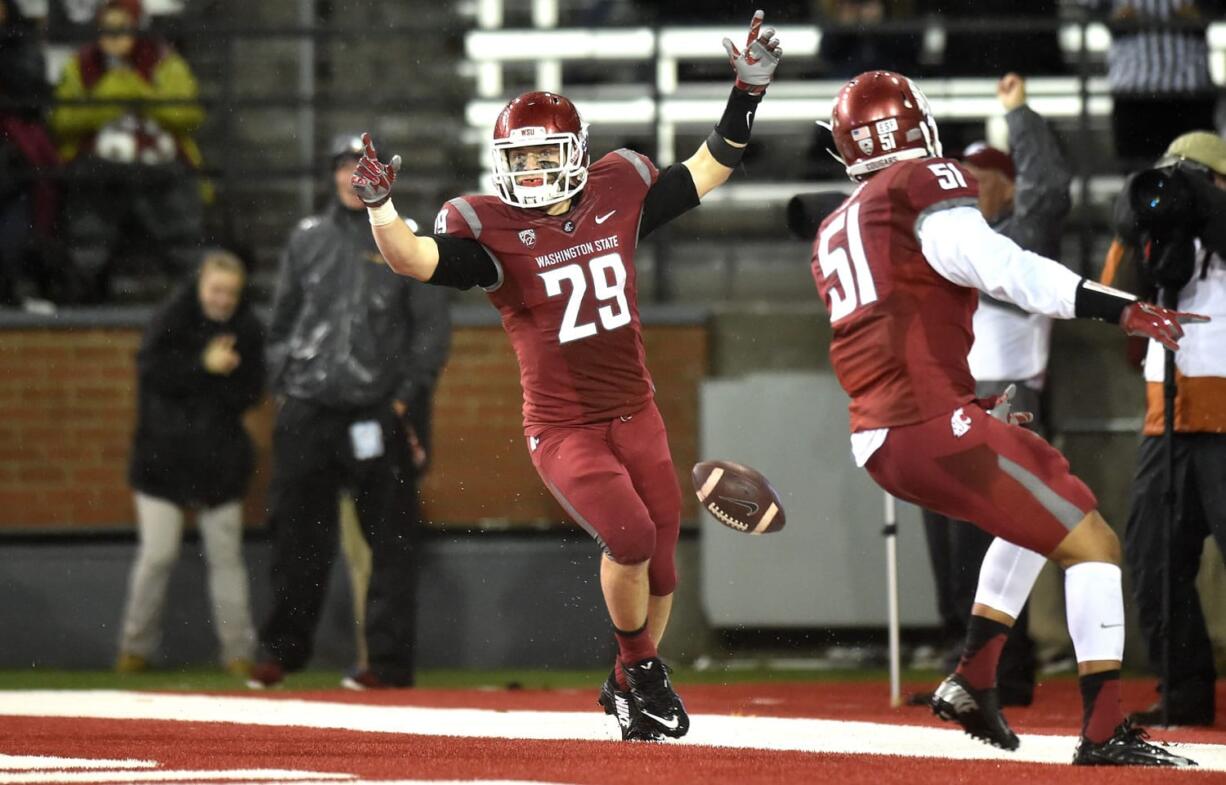 Washington State&#039;s Parker Henry (29) celebrates a defensive play against Stanford on Oct. 31 in Pullman. Henry ranks fourth on the team with 69 tackles headed into the Sun Bowl against Miami on Dec. 26.