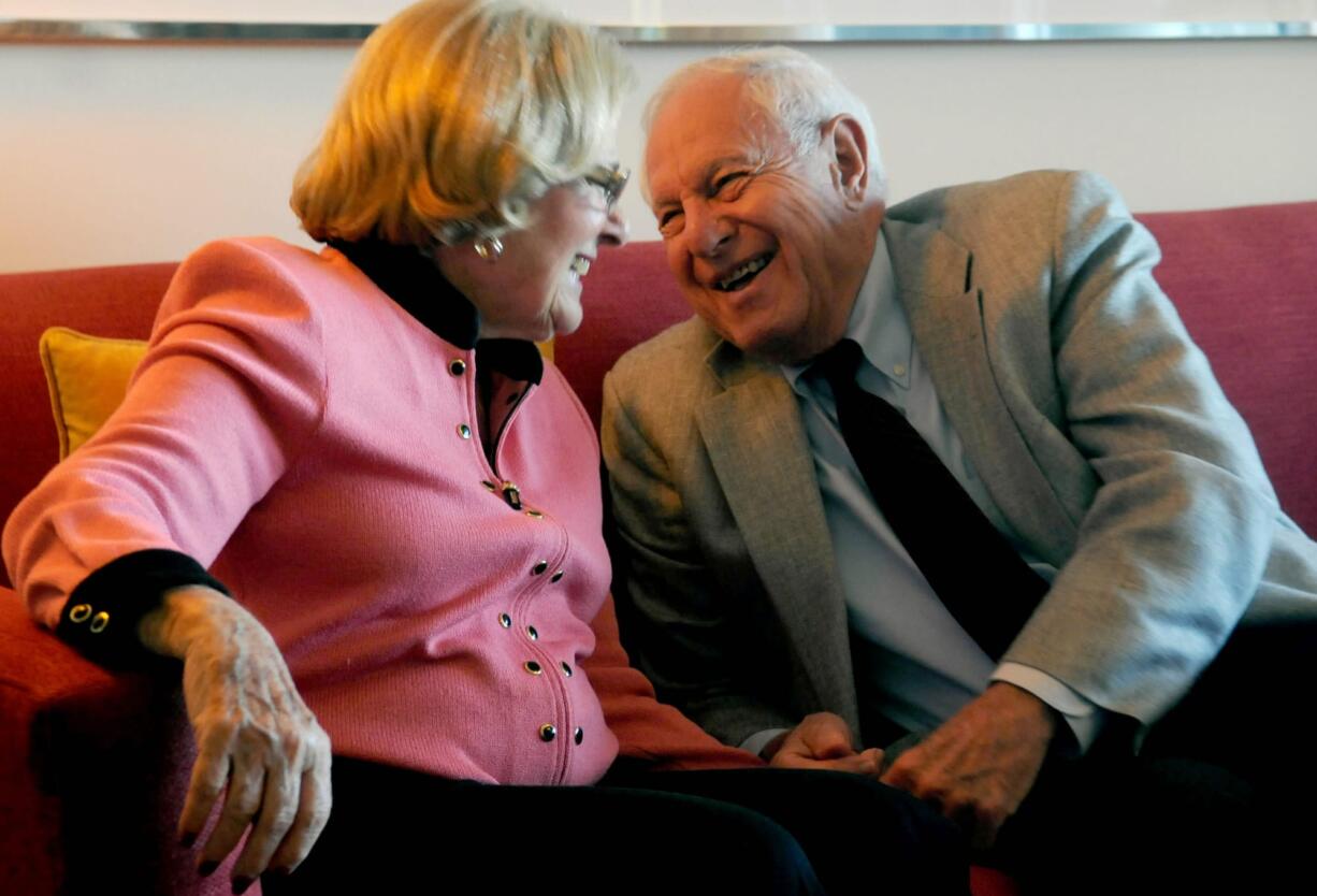 Zelda Luxenberg, left, and Robert Levinson share a laugh Oct. 29 as they talk of about their love story. Zelda and Robert met at the Delray Beach retirement community where they both live.