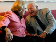 Zelda Luxenberg, left, and Robert Levinson share a laugh Oct. 29 as they talk of about their love story. Zelda and Robert met at the Delray Beach retirement community where they both live.