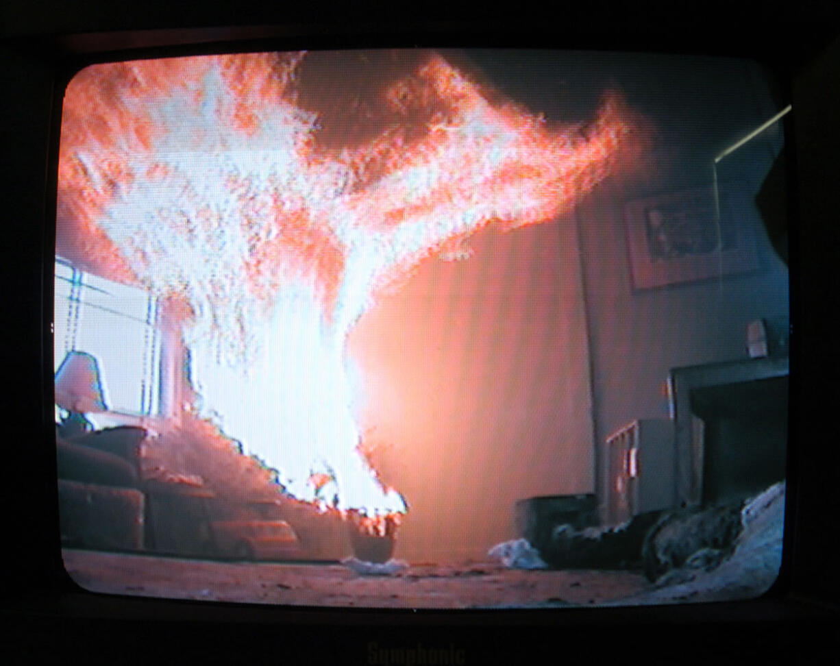 A small video camera set up by Western Fire Center, Inc., captures the spread of a Christmas tree fire during a Vancouver Fire Department training exercise in 2004 at an abandoned house in Vancouver.