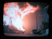 A small video camera set up by Western Fire Center, Inc., captures the spread of a Christmas tree fire during a Vancouver Fire Department training exercise in 2004 at an abandoned house in Vancouver.