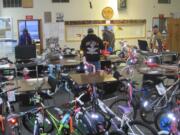 The International Longshore Workers Union Local 4 collects new bikes to give to needy children for the holidays.