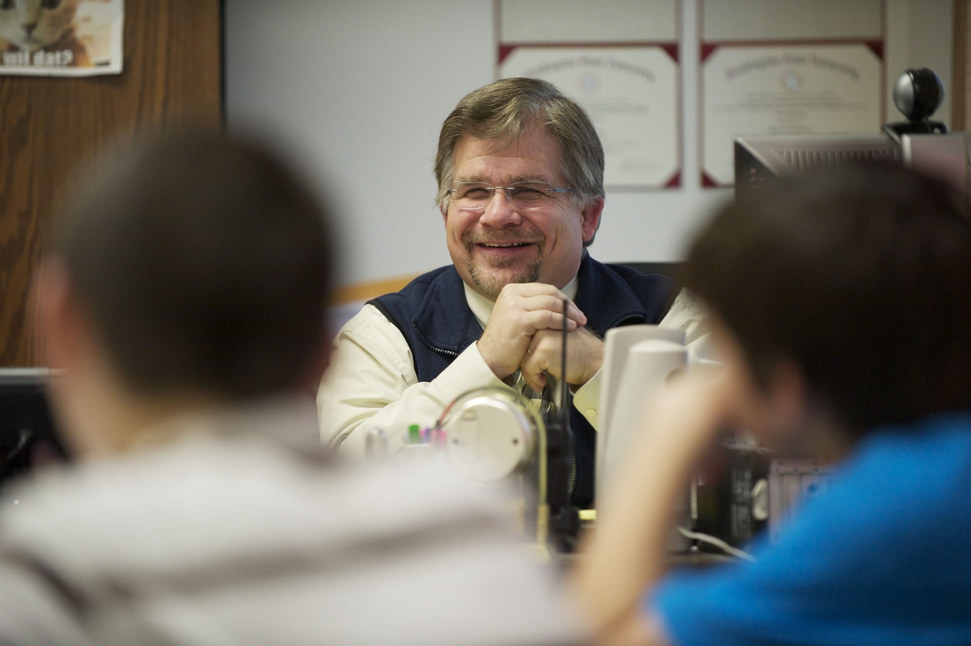 Karl Johnson, a teacher at Summit View Middle School in Battle Ground, watches as his students work on a math assignment.