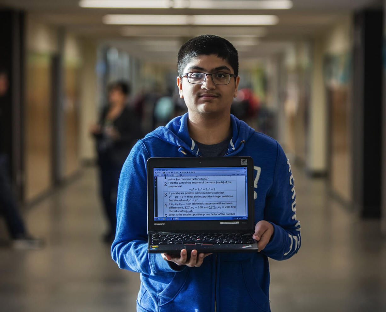 Abishek Hariharan, displaying a math quiz on his laptop, will compete next month against nine other high school students in a national contest called &quot;Who Wants to Be a Mathematician?&quot; (Photos by Steve Ringman/Seattle Times)