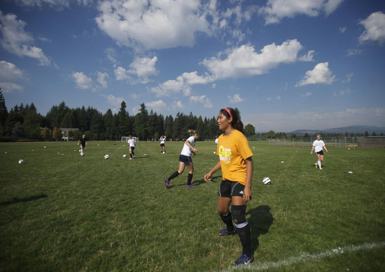 Union's Carlee Maluenda practices with her team on Friday.