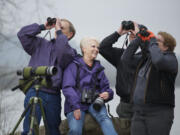 Birders, from left, Arden and Sherry Hagen and Eric and Tammy Bjorkman, all of Vancouver, spent 2012 trying to track down as many species of birds as possible in a challenge known as a &quot;big year.&quot; Both couples beat the previous state record of 359 birds.