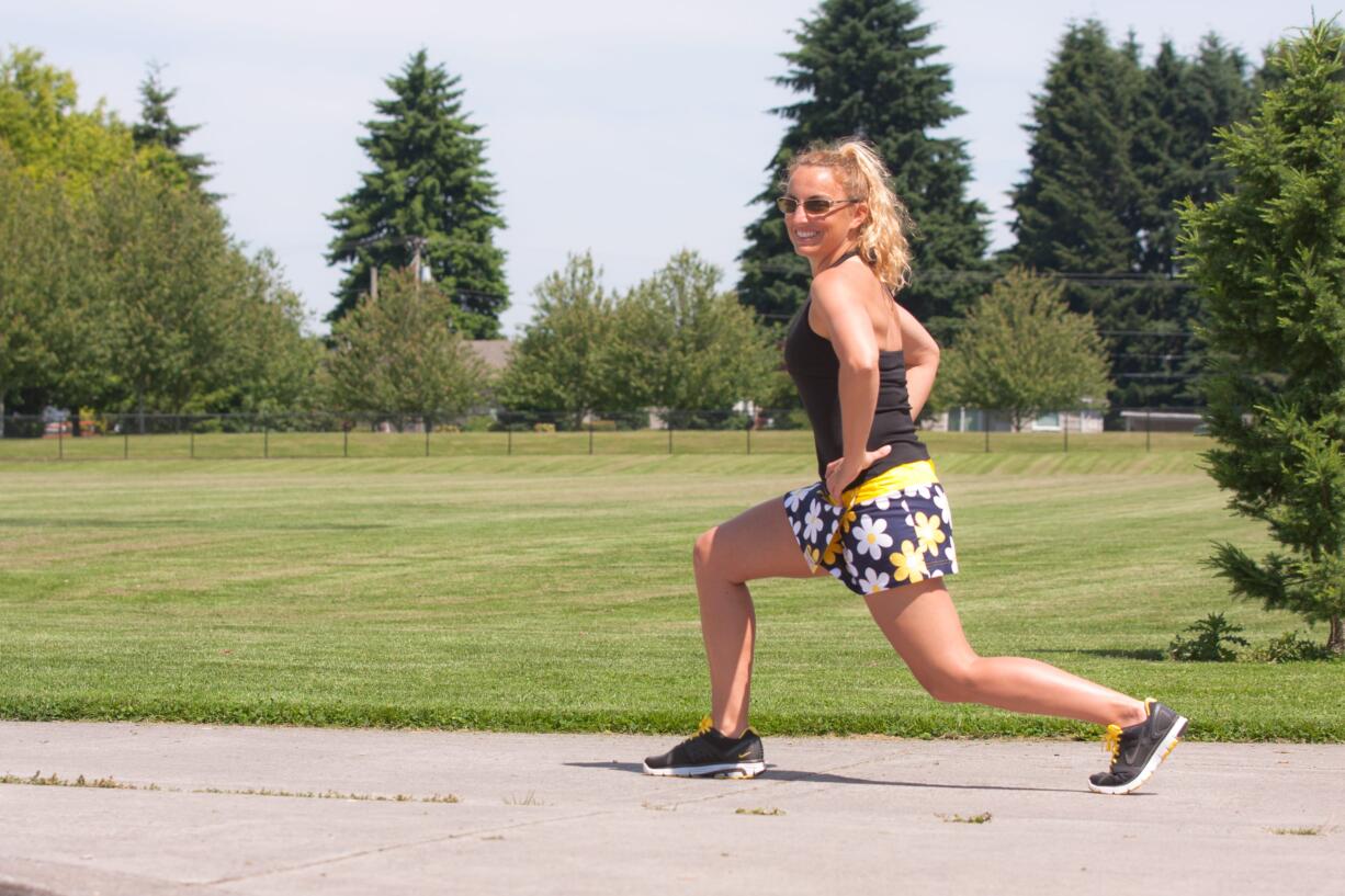 Sherri McMillan demonstrates lunges.