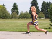 Sherri McMillan demonstrates lunges.