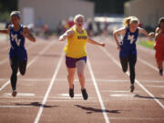 Emily Morgan of Columbia River High School wins the girls 100 meter dash with a time of 12.37 at the 3A District Track and Field meet Wednesday May 8, 2013 in Vancouver, Washington at McKenzie Stadium.