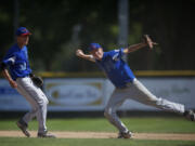 Southern California's Will Proctor attempts to make a play to first base against Naches, Wash., during the second inning of the semifinals of the Little League Junior Boys Western Regionals at Propstra Stadium on Tuesday.