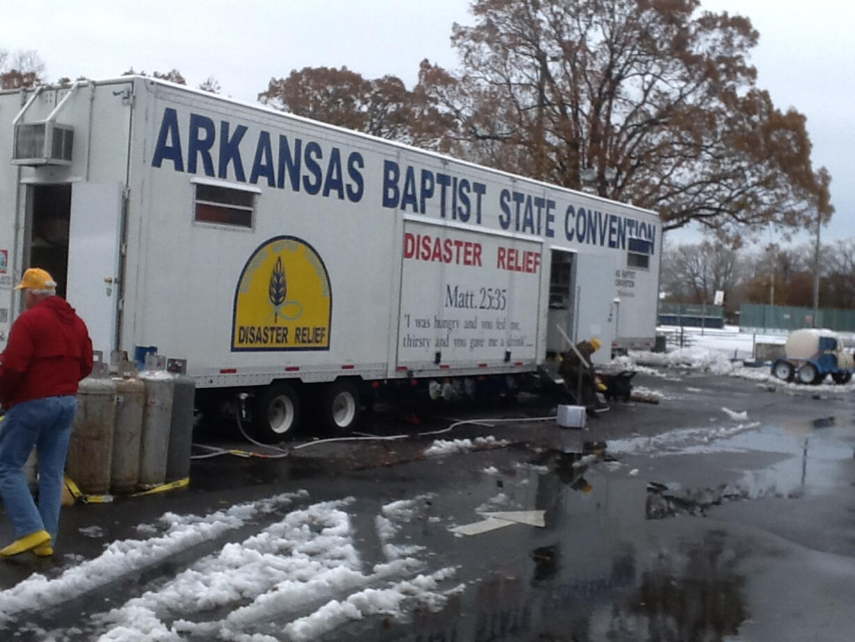 Local Red Cross volunteer Randy Anderson said volunteers from the Arkansas Baptist State Convention got up at 4 a.m. many mornings and cooked meals that he and fellow Red Cross volunteers would then deliver. Then, at the end of the day the Baptist volunteers washed the food containers holding those meals.