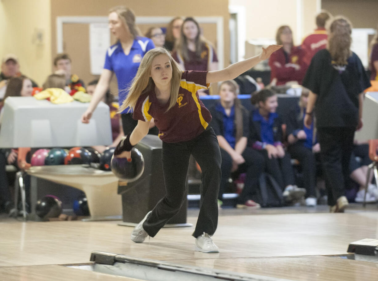 Madi Bash, one of Prairie High School's top bowlers competes at Tiger Bowl in Battle Ground Thursday December 17, 2015.