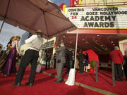 VIP guests arrive at the Kiggins Theatre for the &quot;Vancouver Goes Hollywood&quot; Academy Awards party on Sunday. Guests watched the Academy Awards on the theater's big screen.