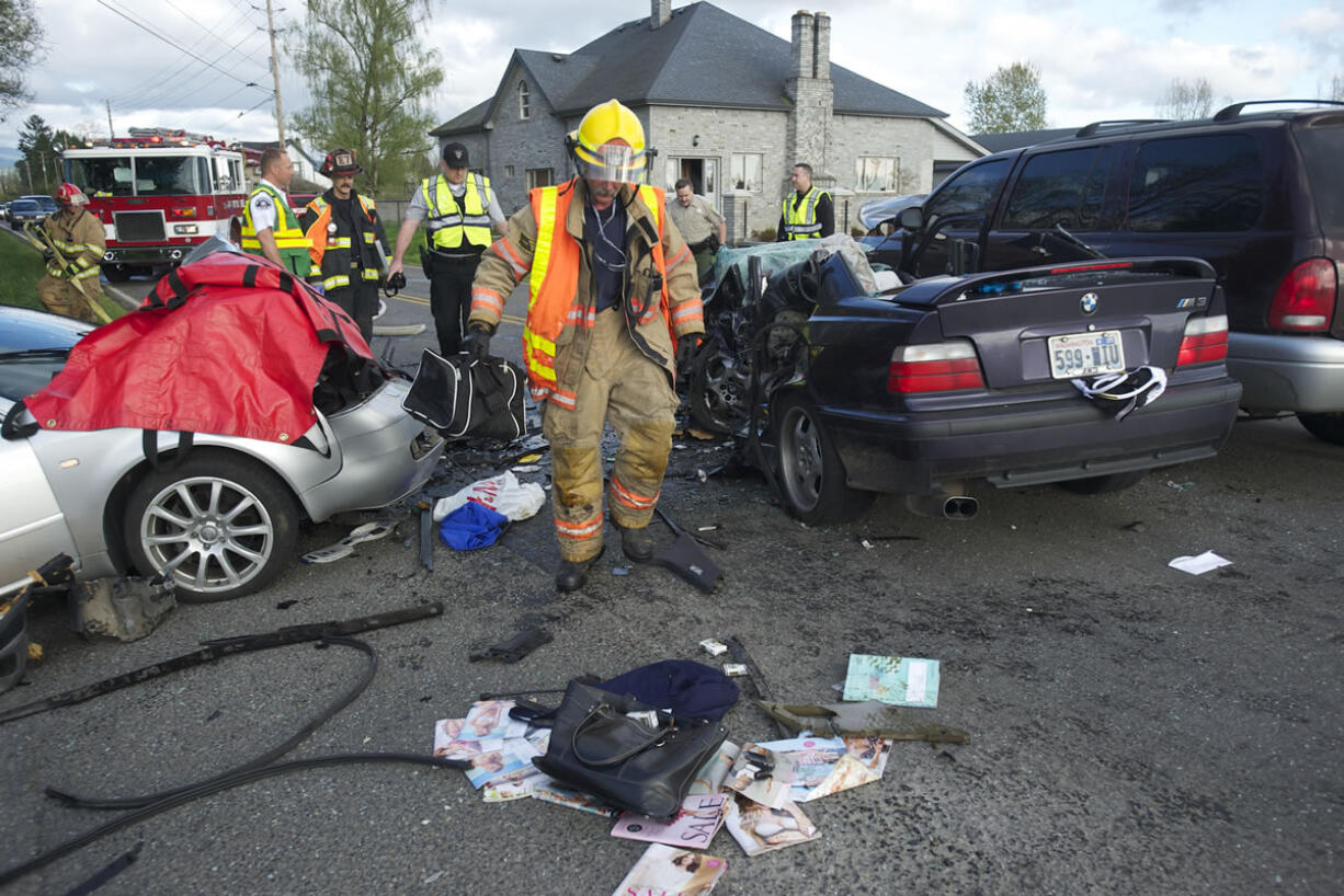 A three-vehicle collision Wednesday evening blocks the intersection of Northeast 119th Street and 132nd Avenue.