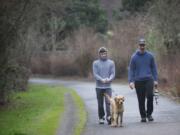 It was a bird-dog training day for Aaron Shinn, right, his son Buck, 16, and Charlie, their 11-month-old yellow lab.