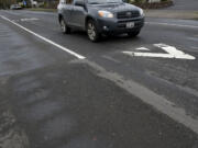 A car approaches a speed bump heading northbound on Kauffman Avenue in 2009.