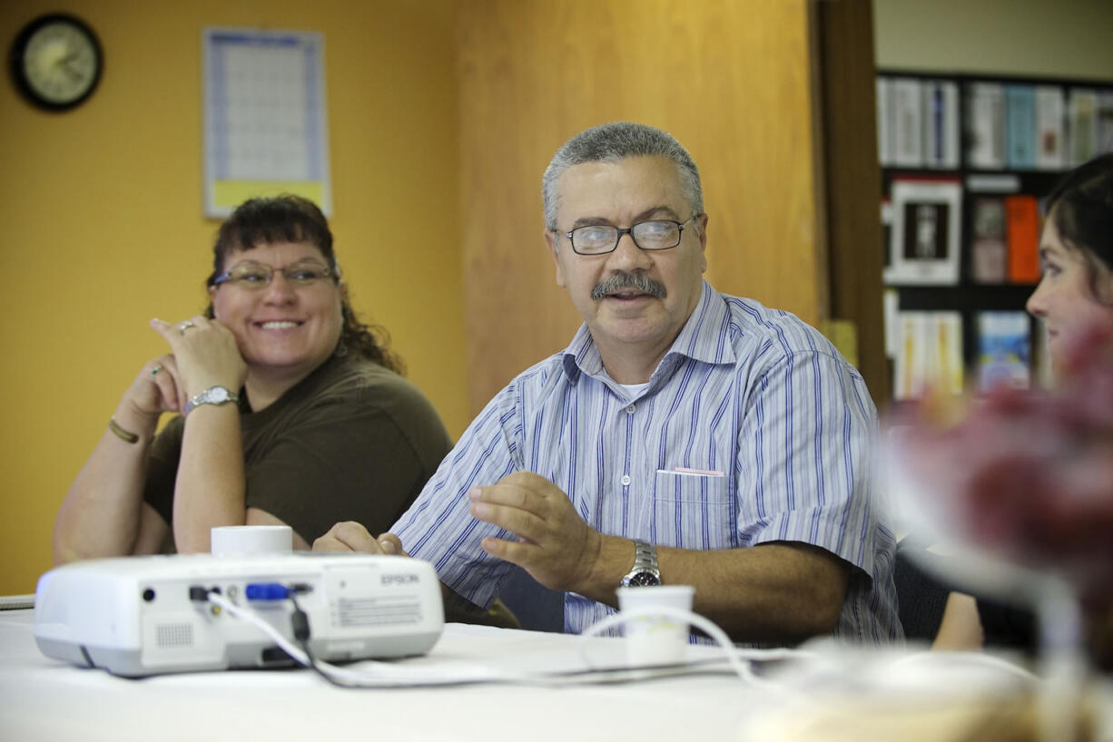 Iraqi refugee Salih Al Fahham, 53, describes the newness of everything in America during a discussion of refugee resettlement hosted by Lutheran Community Services Northwest.