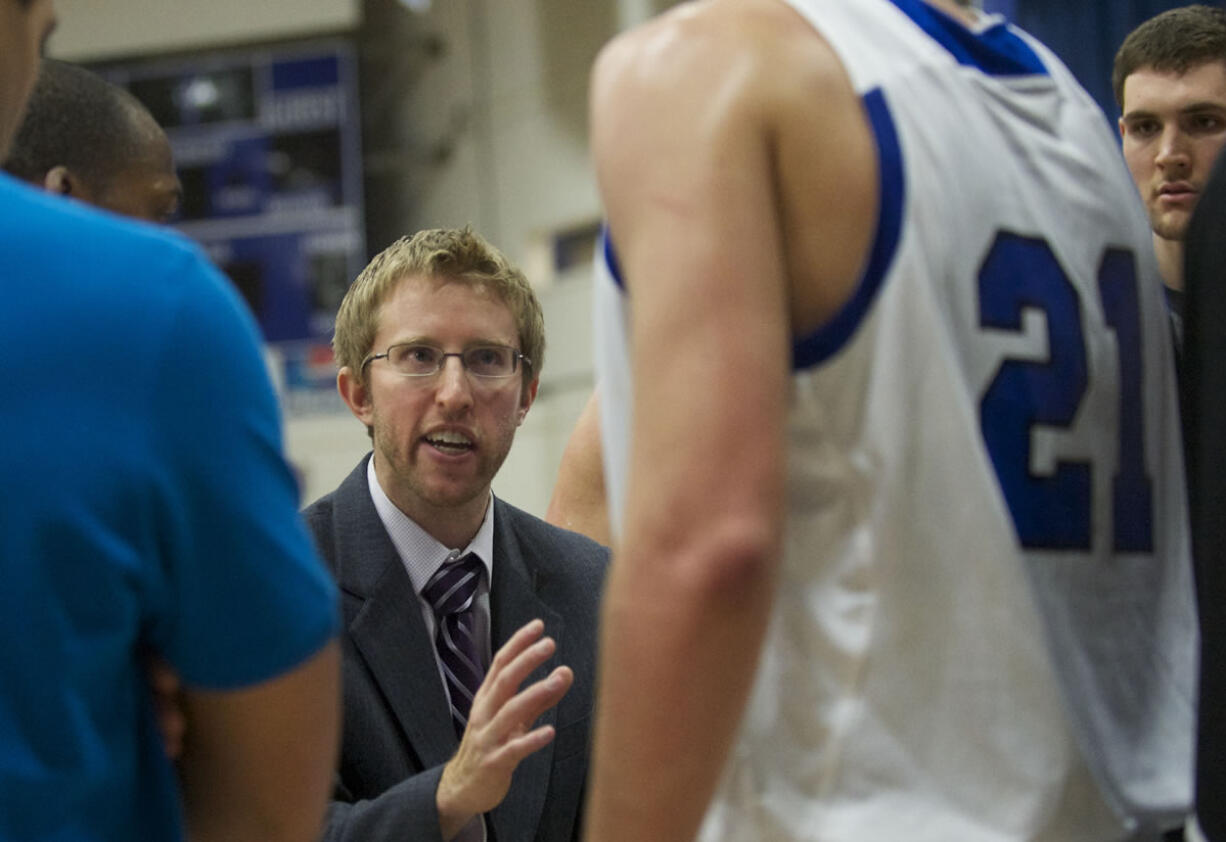 The Clark College men's basketball team head coach Alex Kirk during a timeout in the first half against Portland Community College inside the O'Connell Center at Clark on Wednesday November 28, 2012.