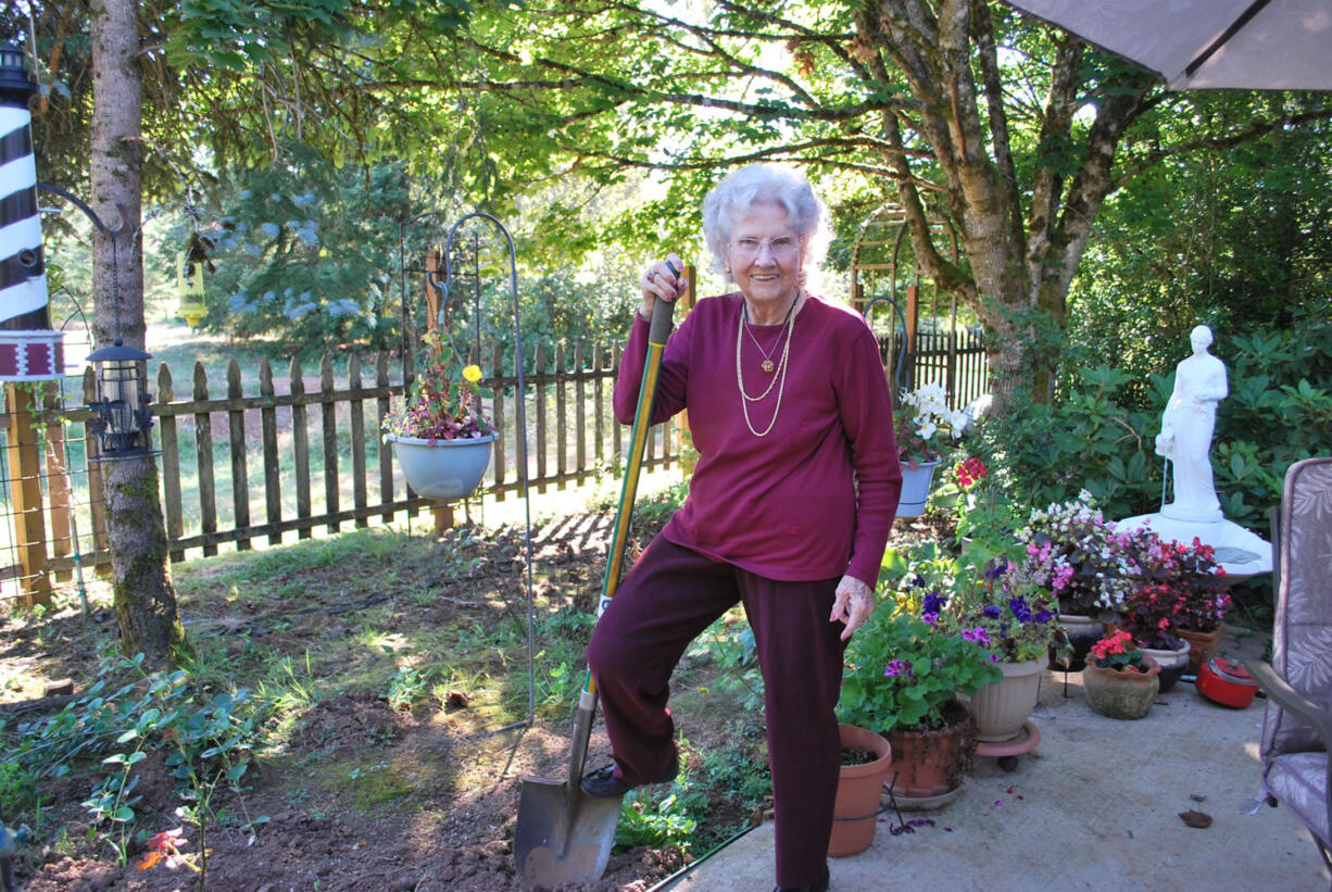 Louise Heberling works in her Vancouver garden.