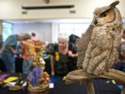 A great horned owl carved by Darrell Wilson, of Calgary, Alberta, proved to be a crowd favorite Sunday by taking home the People's Choice award at the Columbia Flyway Wildlife Show at the Water Resources Education Center in Vancouver.