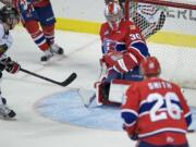 Nicolas Petan of the Winterhawks opened up the scoring by getting the puck past Spokane Chiefs' goaltender Garret Hughson in the first period at the Rose Garden on Jan. 11.