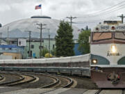 The Amtrak Cascades Train No. 513 passes the Tacoma Dome and heads south toward downtown Tacoma on May 16.