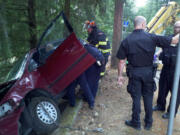 Firefighters on Friday morning extricated a trapped victim inside a car near Hathaway Park in Washougal.