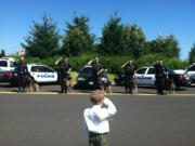 Andresen/St. Johns: Clark County's honorary sheriff Carter Harris got a chance to &quot;inspect&quot; K-9 teams Aug. 1. The 5-year-old, diagnosed with leukemia in 2010, was a participant in the Washington State Chief for a Day program last year.