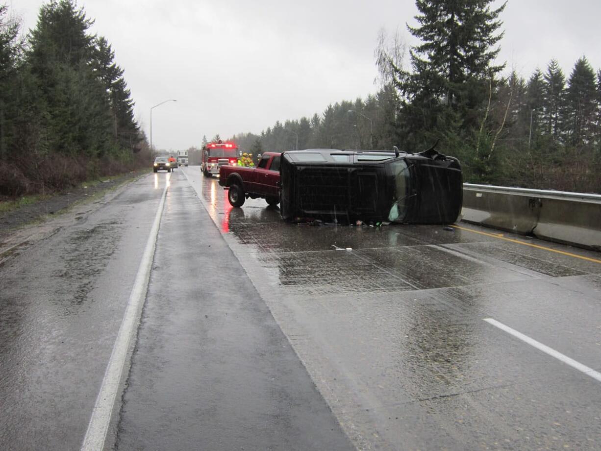 A two-vehicle crashed closed both northbound lanes of Interstate 205 for about an hour Friday