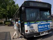 C-Tran's Route 39 bus stops for a passenger on East Fourth Plain Boulevard  on Aug.