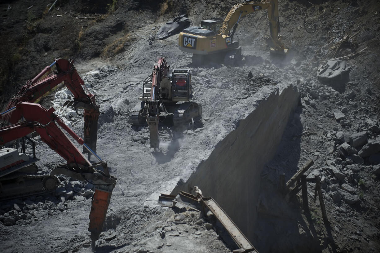 At the peak of Condit Dam demolition in July, shown here, crews were removing about 500 cubic yards of concrete per day. The dam was breached in October.