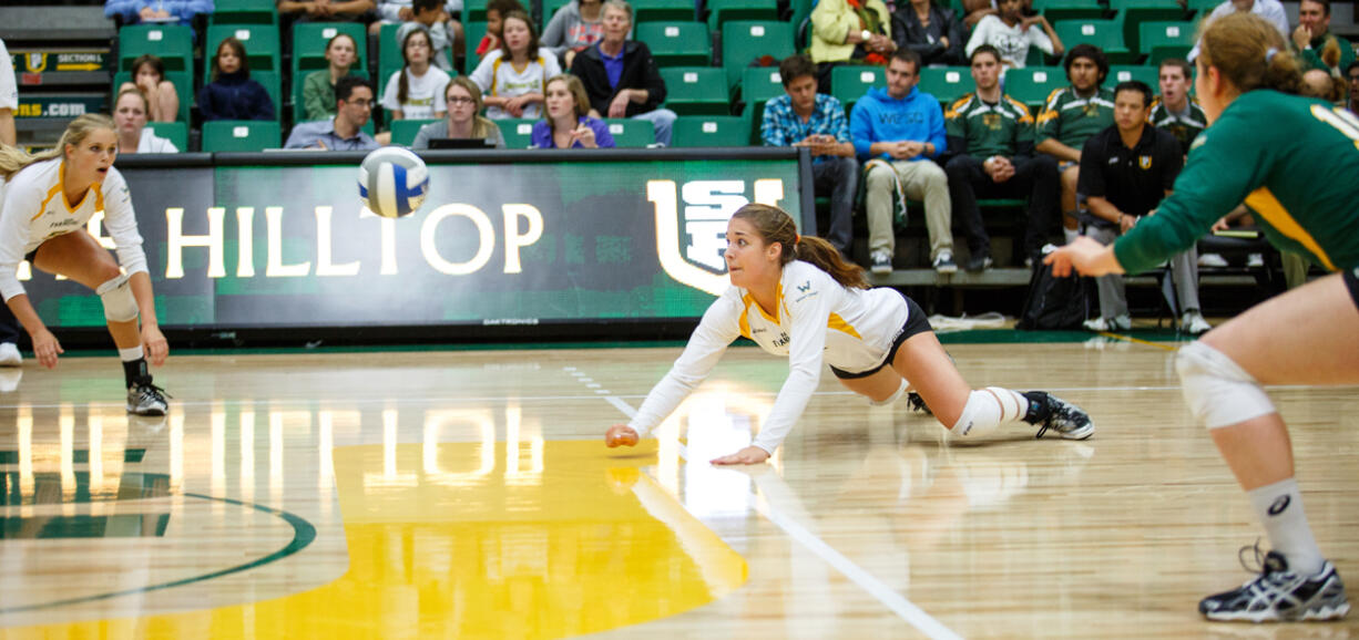 Leanna Ludes goes for a dig in a recent University of San Francisco volleyball match.