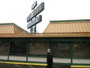 Woodland City Councilor John J. Burke surveys the Oak Tree Casino Restaurant, which closed at the end of December.