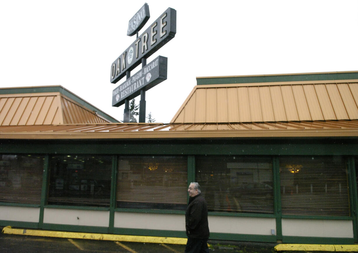 Woodland City Councilor John J. Burke walks though the parking lot of the Oak Tree Casino Restaurant, which shut abruptly in December.