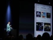 Eddy Cue, the Apple senior vice president of Internet Software and Services, demonstrates the new iTunes Radio during the keynote address of the Apple Worldwide Developers Conference on Monday.