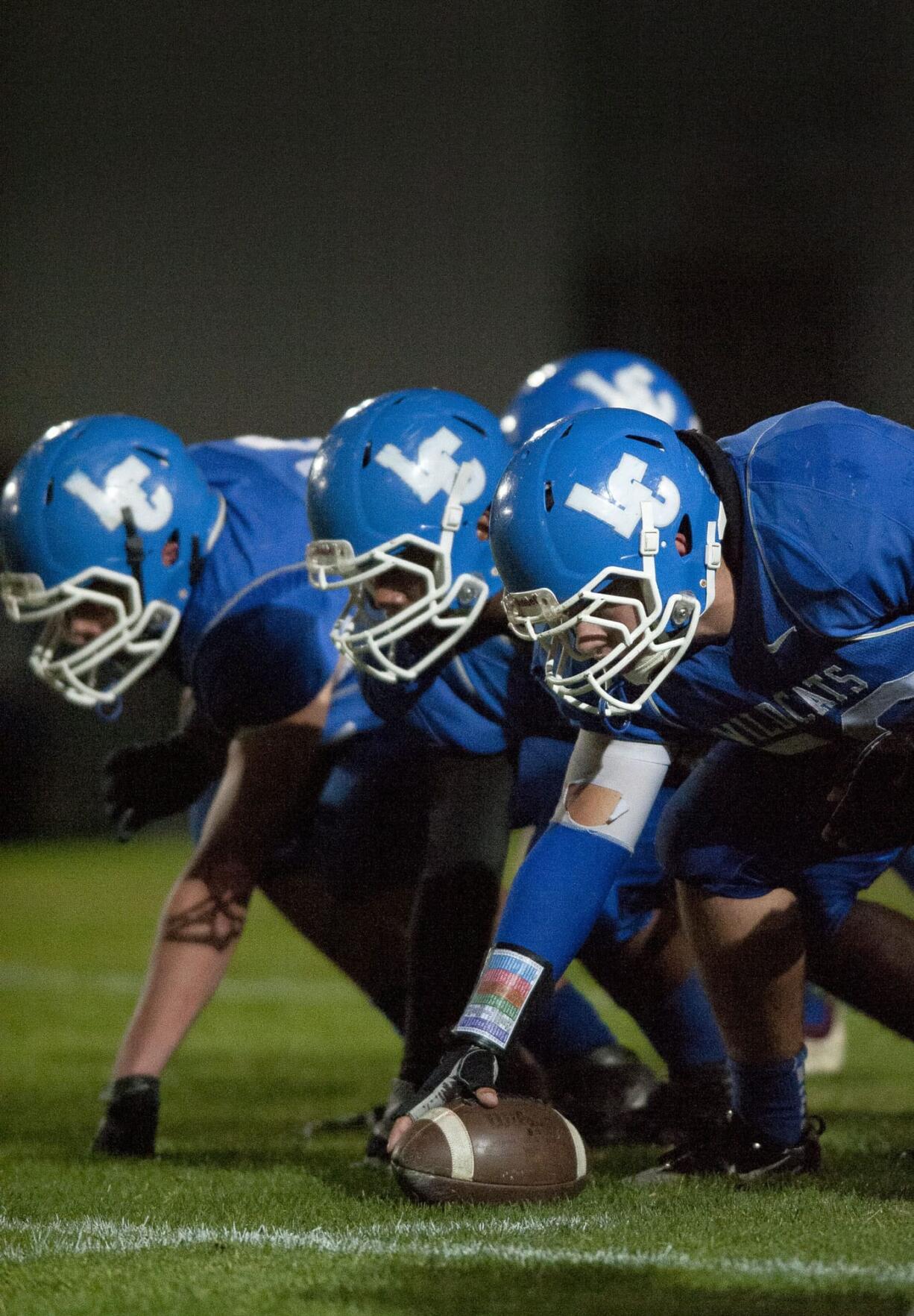 La Center's offensive line might be small, but it has opened plenty of holes for a strong rushing attack this season.