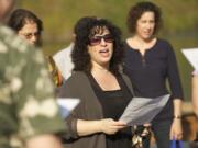 Rabbi Elizabeth Dunskerof Congregation Kol Ami leads a traditional Tashlich ceremony Monday afternoon at Klineline Pond in Salmon Creek.